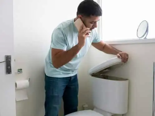 Toilet repair in Portland home bathroom